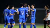 Al Duhail players celebrate after winning the match.