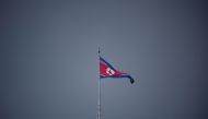 A North Korean flag flutters at the propaganda village of Gijungdong in North Korea, in this picture taken near the truce village of Panmunjom inside the demilitarized zone (DMZ) separating the two Koreas, on July 19, 2022. (REUTERS/Kim Hong-Ji)