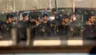 Iran's riot police forces stand in a street in Tehran, Iran, on October 3, 2022. WANA (West Asia News Agency) via REUTERS
