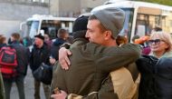 Russian reservists bid farewell to relatives and acquaintances before their departure for a base in the course of partial mobilization of troops, aimed to support the country's military campaign in Ukraine, in Omsk, Russia October 7, 2022. REUTERS/Alexey Malgavko/File Photo