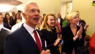 Latvian Prime Minister Arturs Krisjanis Karins reacts at 