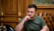 Ukraine's President Volodymyr Zelenskiy is seen during a phone call with U.S. President Joe Biden, amid Russia's attack on Ukraine, in Kyiv, Ukraine October 4, 2022. Ukrainian Presidential Press Service/Handout via REUTERS
