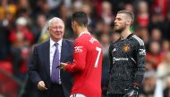 Manchester United's Cristiano Ronaldo and David de Gea with former manager Alex Ferguson before the match against Newcastle United at Old Trafford, Manchester, Britain, on October 16, 2022.  REUTERS/David Klein
