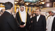 Minister of Commerce and Industry H E Sheikh Mohammed bin Hamad bin Qassim Al Thani and Vice President for Economic Affairs of the Islamic Republic of Iran H E Mohsen Rezaei during the inauguration of QI International Trade Fair for Iranian Products.
