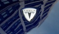 A logo of Tesla Motors on an electric car model is seen outside a showroom in New York, June 28, 2010. (REUTERS/Shannon Stapleton)