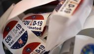 Patients receive stickers after receiving the coronavirus disease (Covid-19) booster vaccine targeting BA.4 and BA.5 Omicron sub variants at Skippack Pharmacy in Schwenksville, Pennsylvania, US, September 8, 2022. (REUTERS/Hannah Beier)