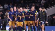 Newcastle United's Callum Wilson celebrates with teammates after the EPL match against Tottenham Hotspur at the Tottenham Hotspur Stadium, London, Britain, on October 23, 2022.  Action Images via Reuters/Paul Childs 