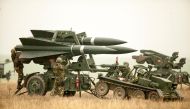 Romanian Army soldiers deploy a HAWK PIP III R ground-to-air missile launch pad during a joint military exercise with the US Army that aimed to test the interoperability of U.S. and Romanian armed forces in the event of a missile attack, near Corbu village in Constanta county, Romania, on November 8, 2016.  File Photo / Reuters