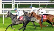 Moshrif and jockey Olivier Peslier on their way to victory. PIC: Robert Polin