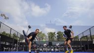 Enrique Goenaga Garcia and Jairo J. Bautista Ortiz in action during the doubles match against Aday Santana and Nicolas Suescun at New Giza Premier Padel P1 tournament at New Giza sports club on Wednesday. 