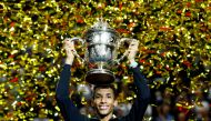Canada's Felix Auger-Aliassime celebrates with the trophy after winning his Swiss Indoors Basel final match against Denmark's Holger Rune at St. Jakobshalle, Basel, Switzerland, on October 30, 2022.  REUTERS/Arnd Wiegmann 