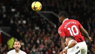Manchester United's English striker Marcus Rashford heads home the only goal of the English Premier League football match between Manchester United and West Ham United at Old Trafford in Manchester, north-west England, on October 30, 2022.  (Photo by Oli SCARFF / AFP) 