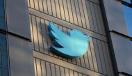 In this file photo taken on October 28, 2022, the Twitter logo is seen on the exterior of Twitter headquarters in San Francisco, California.  (Photo by Constanza HEVIA / AFP)