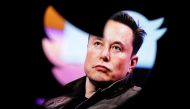 Elon Musk's photo is seen through a Twitter logo in this illustration taken on October 28, 2022.  File Photo / Reuters 