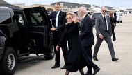 US President Joe Biden and US First Lady Jill Biden walk to their vehicle after disembarking Air Force One at Joint Base Andrews in Maryland on October 31, 2022.  (Photo by Mandel NGAN / AFP)