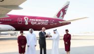Qatar Airways Group Chief Executive H E Akbar Al Baker (second right), FIFA President Gianni Infantino (centre) and MATAR Chief Operations Officer Engr. Badr Al Meer (second left) along with Qatar Airways crew at Hamad International Airport tarmac. 