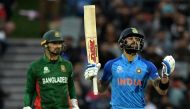India's Virat Kohli gestures after a shot for four runs during the ICC men's Twenty20 World Cup 2022 cricket match between India and Bangladesh at Adelaide Oval on November 2, 2022 in Adelaide. Photo by Brenton Edwards / AFP