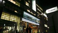 People walk outside the headquarters of Yandex company in Moscow, on September 14, 2015. File Photo / Reuters