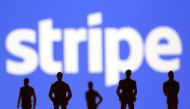Small toy figures are seen in front of Stripe logo in this illustration picture taken March 15, 2021. File Photo / Reuters
