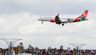 A Kenya Airways passenger Embraer 190 plane manoeuvres at the Kenya Defence Forces (KDF) Museum Air Show Festival in conjunction with the Aero Club at the Uhuru Gardens in Nairobi, Kenya, May 28, 2022. (REUTERS/Monicah Mwangi)