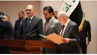 Iraqi President Abdul Latif Rashid takes his oath of office in front of Iraqi lawmakers in Baghdad, Iraq, October 13, 2022. Iraqi Parliament Media Office/Handout via REUTERS