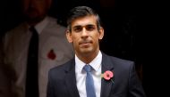 British Prime Minister Rishi Sunak walks outside Number 10 Downing Street in London, Britain, November 2, 2022. REUTERS/John Sibley