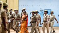 (FILES) In this file photo taken on July 24, 2019, Nalini Sriharan (C in orange), who was convicted in the assassination case of former prime minister Rajiv Gandhi, is released from the Vellore Central Prison on a one-month parole to attend her daughter's wedding, in Vellore. Photo by AFP