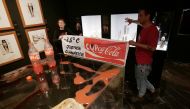Climate activists of 'Futuro Vegetal' pose after throwing syrup and beetroot juice to resemble petrol and blood at the Egyptian Museum in Barcelona, Spain, November 13, 2022. (Futuro Vegetal via REUTERS)