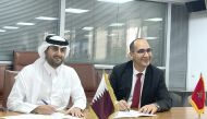 Director of the Department of International Cooperation and Trade Agreements at the Qatari Ministry of Commerce and Industry, Saleh Abdullah Al Mana and Director General of Trade at the Moroccan Ministry of Industry and Trade, Abdelouahed Rahal during the signing of agreement.