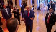 Former US President Donald Trump talks to the press on the grounds of his Mar-a-Lago resort on midterm elections night in Palm Beach, Florida, US November 8, 2022. Reuters/Ricardo Arduengo/File Photo