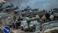 Ukrainian tanks and military vehicles are seen at a road, as Russia's attack on Ukraine continues, in Kherson region, Ukraine, on November 18, 2022. REUTERS/Viacheslav Ratynskyi