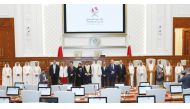 Speaker of the Shura Council H E Hassan bin Abdullah Al Ghanim with the visiting speakers of parliamentary councils and officials, yesterday.