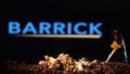 A small toy figure and gold imitation are seen in front of the Barrick logo in this illustration taken November 19, 2021. REUTERS/Dado Ruvic/Illustration/File Photo