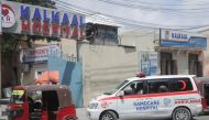 A Somacare ambulance carrying an unidentified wounded person drives into the Kalkaal hospital, in Mogadishu, Somalia November 28, 2022. Reuters/Feisal Omar