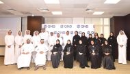 QNB officials pose for a photograph at the Emerging Leaders Program.