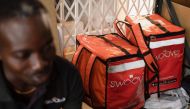 A worker prepares orders inside the office of Ghanaian courier logistics startup Swoove, in Accra, Ghana November 25, 2022. REUTERS/Francis Kokoroko