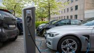 This file photo taken on April 30, 2019 shows electric cars that are being charged in a street in Oslo, Norway. (AFP/Jonathan Nackstrand)