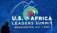 Attendees of the US - Africa Leaders Summit walk through the Walter E. Washington Convention Center, the site of the summit that brings together leaders from across Africa to meet with US President Joe Biden and other US representatives, in Washington, DC, on December 13, 2022. (Photo by SAUL LOEB / AFP)