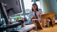 Director of the pediatric ward of Berlin's Saint Joseph Hospital Beatrix Schmidt speaks during an AFP interview at her desk on December 13, 2022. Photo by John MacDougall / AFP