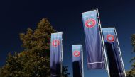 Flags with UEFA logo are seen outside of the Union of European Football Associations headquarters in Nyon, Switzerland, October 5, 2022. File Photo / Reuters