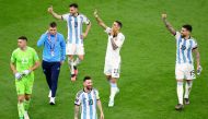 Argentina's Lionel Messi, Angel Di Maria, Nicolas Otamendi, Emiliano Martinez and Nicolas Tagliafico celebrate qualifying for the World Cup final. (REUTERS/Hannah Mckay)