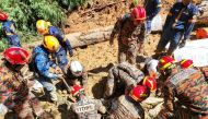 Rescuers work during a rescue and evacuation operation following a landslide at a campsite in Batang Kali, Selangor state, on the outskirts of Kuala Lumpur, Malaysia, December 16, 2022, in this picture obtained from social media. Korporat JBPM/via REUTERS