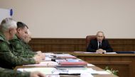 Russian President Vladimir Putin visits the Joint Headquarters of the Russian armed forces involved in military operations in Ukraine, in an unknown location in Russia, in this picture released December 17, 2022. Sputnik/Gavriil Grigorov/Kremlin via Reuters