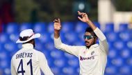 India's Axar Patel (R) celebrates with teammates after the dismissal of the Bangladesh's Mushfiqur Rahim (not pictured) on December 17, 2022. (Photo by Munir uz Zaman / AFP)