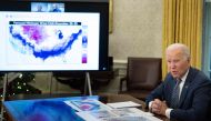 US President Joe Biden speaks during a briefing on the winter storm system traversing the US and the expected impacts, in the Oval Office of the White House in Washington, DC, on December 22, 2022. (Photo by Brendan Smialowski / AFP)