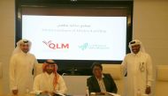 Officials at Sidra Medicine and QLM Life and Medical Insurance Company during the signing ceremony. 