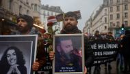 Members of the Kurdish community attend a march organised by the Kurdish Democratic Council in France (CDK-F) in tribute to the victims of Friday's deadly attack, in Paris, France, on December 26, 2022. REUTERS/Sarah Meyssonnier