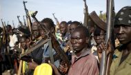 Jikany Nuer White Army fighters holds their weapons in Upper Nile State, South Sudan February 10, 2014. File Photo / Reuters