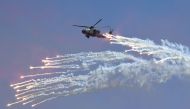A South Korean Navy Lynx helicopter fires flares during a commemoration ceremony marking South Korea's Armed Forces Day, which will fall on October 1, at the Second Fleet Command of Navy in Pyeongtaek on September 28, 2017. REUTERS/Jung Yeon-Je/Pool
