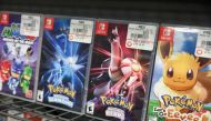 Pokemon games are seen on sale in a GameStop in Manhattan, New York, U.S., December 7, 2021. REUTERS/Andrew Kelly/File Photo